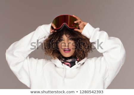Młoda kobieta na snowboardzie Zdjęcia stock © NeonShot