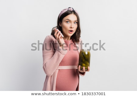 Stock foto: Young Pregnant Woman In Studio