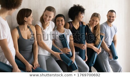 Stockfoto: Young People Resting And Enjoying Conversation After Finished Wo