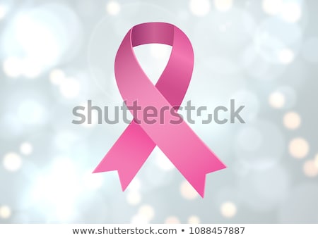 Foto stock: Pink Ribbon For Breast Cancer Awareness Over Bright Background