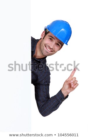Stockfoto: A Construction Worker Rising His Finger