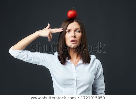 Foto stock: Woman Biting Into An Apple