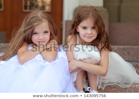 ストックフォト: Beautiful Young Bride With A Wedding Bouquet Sitting At The Sofa