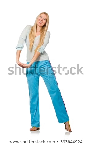 [[stock_photo]]: Young Woman Wearing Blue Training Pants Isolated On White