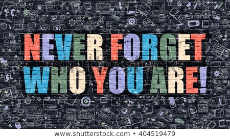 Stock photo: Never Forget Who You Are Multicolor On Dark Brickwall