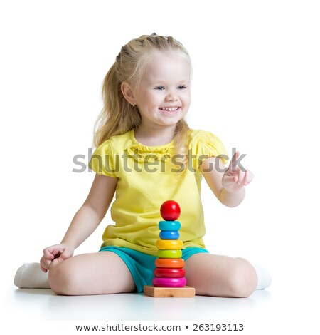 ストックフォト: Adorable Toddler Girl Playing With A Colorful Pyramid