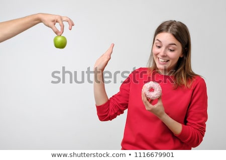 Stok fotoğraf: Happy Woman Eating Apple Instead Of Cake