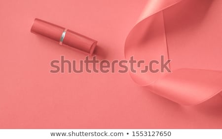 Stock fotó: Luxury Lipstick And Silk Ribbon On Coral Holiday Background Mak