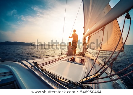 Stock photo: Young Couple In Sail Boat