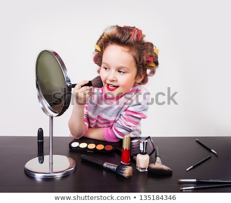ストックフォト: Young Mother Paints Little Girl Cosmetics