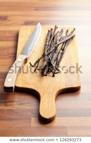 Foto stock: Vanilla Pods On Chopping Board