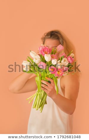 Foto stock: Romantic Woman With Blond Hair With Tulip Bouquet