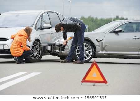 Foto d'archivio: Driver Man Examining Damaged Automobile Cars