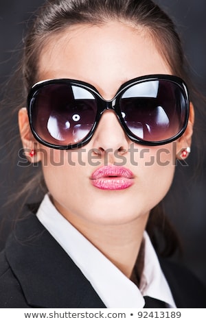 Femme d'affaires envoyant un gros baiser [[stock_photo]] © iMarin