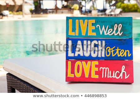 Stok fotoğraf: Inspirational Motivational Life Quote Wooden Board Live Well Laugh Often Love Much On Summer