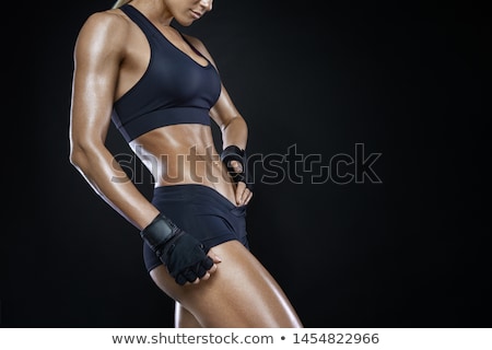 Сток-фото: Fit Woman With Barbells Isolated On Black