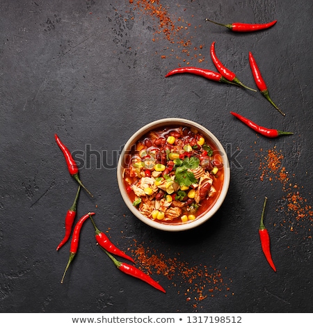 Imagine de stoc: Chili Peppers In Authentic Ceramic Bowl