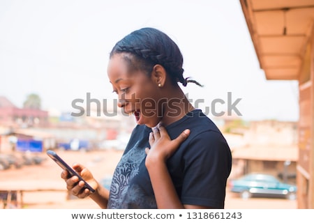 Foto d'archivio: Portrait Of A Shocked Young African Woman