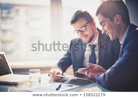 Foto stock: Two Businesspeople Working In Office