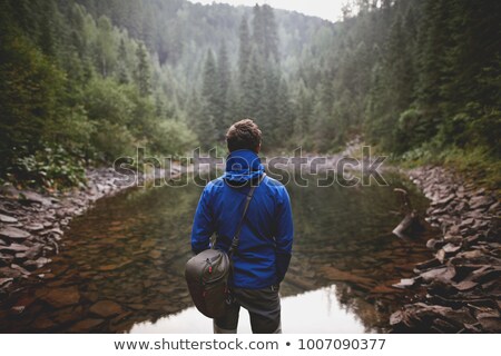 Imagine de stoc: Hiker Looking Into The Distance