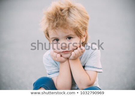 Stock photo: Blond Resting Head On Hands