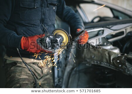 Stock photo: Worker With A Sander