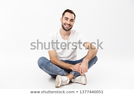 Stock fotó: Casual Man Sitting On The Floor