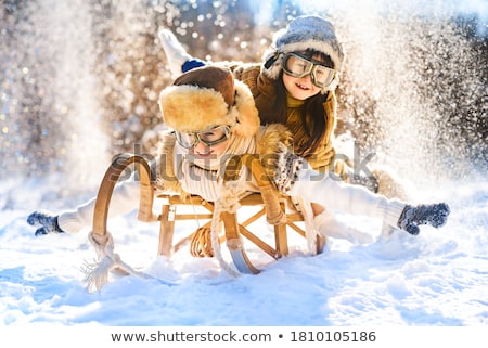 Stock foto: Boy Lying In The Snow