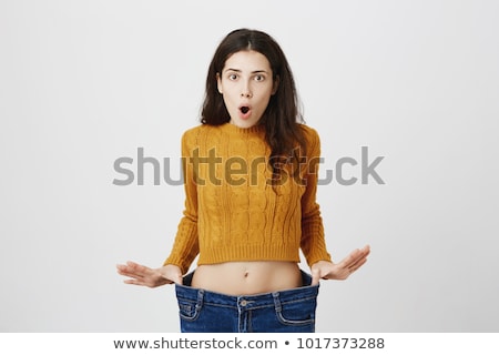 Stock photo: Pretty Girl In Jeans Lost Weight