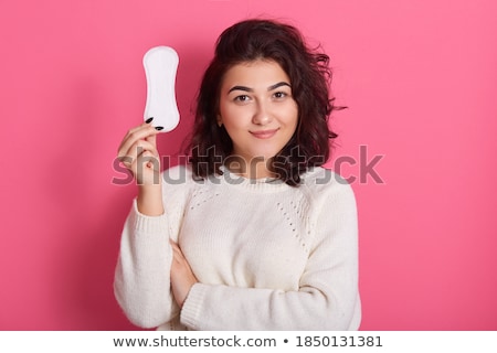 Foto stock: Woman Holding Sanitary Pad