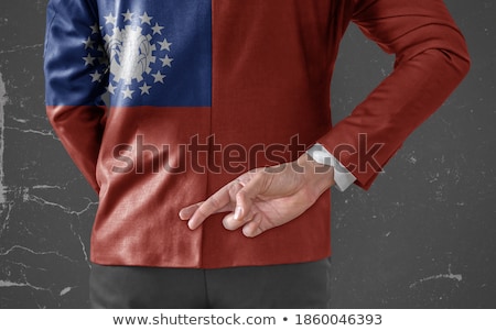 Stockfoto: Burma Flag In His Hand