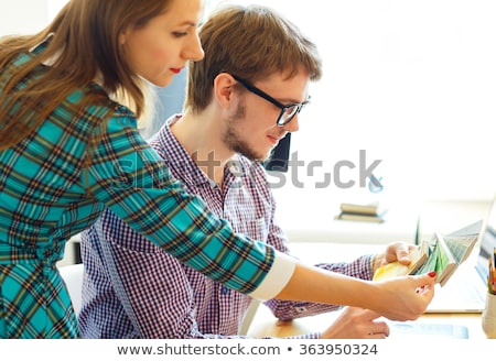 Stock foto: Man Looking To A Color Paint Palette At Home Office