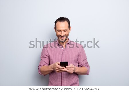 [[stock_photo]]: Man Looking On Pda