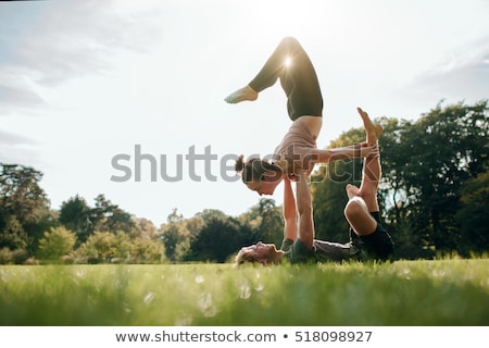 Сток-фото: Couple Doing Acrobatic Yoga