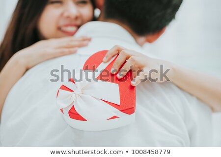 [[stock_photo]]: Woman Embracing Her Boyfriend