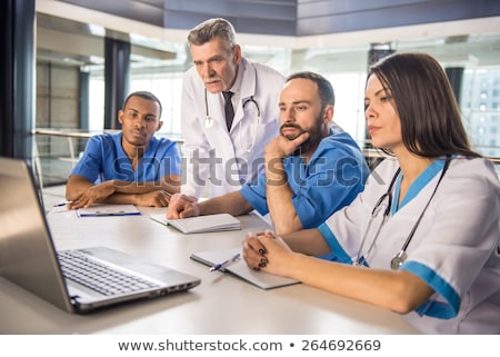 Stok fotoğraf: Health Care Professionals Working In Laboratory