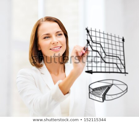 Foto stock: Business Woman Draws Forecast