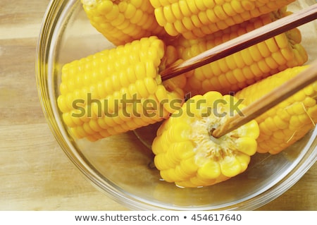 Stockfoto: Boiled Sweet Corn Cobs With Salt On Wooden Background