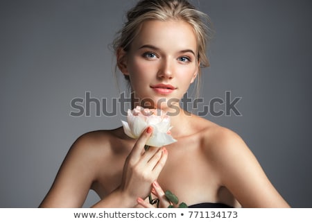 Stock photo: Portrait Of Beautiful Female Model On Gray Background