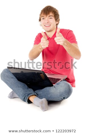 Foto stock: Excited Man Sitting With Hands Up Pointing And Screaming