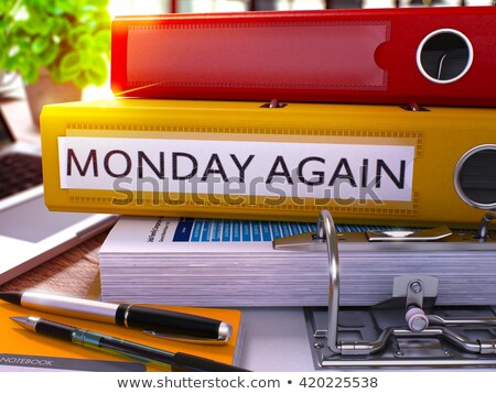 Foto stock: Yellow Ring Binder With Inscription Monday Again
