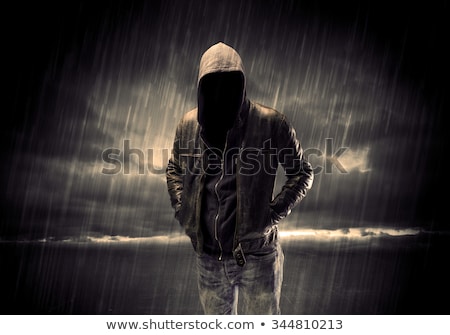 Foto d'archivio: Mysterious Suspicious Faceless Man With Hoodie