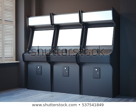 Foto d'archivio: Three Old Gaming Machines In A Bright Room 3d Rendering