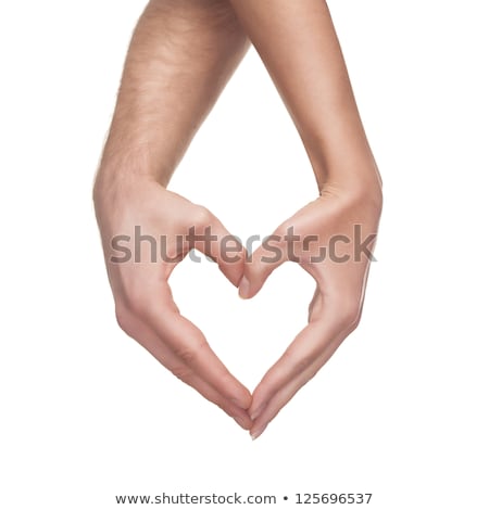 Foto stock: Man And Woman Hands Shows Heart Gesture