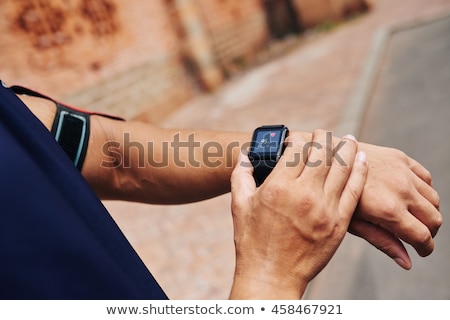 [[stock_photo]]: Checking Pulse With Smartwatch