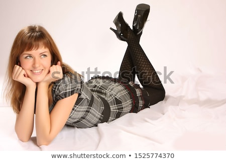 Foto stock: Woman Dreaming In Fishnet