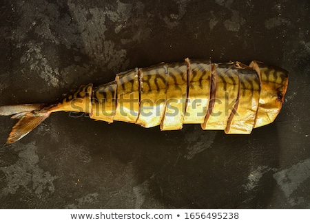 Foto stock: Dish With The Cut Smoked Mackerel Background