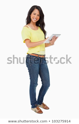 Сток-фото: Latin Student Using A Touch Pad Against White Background