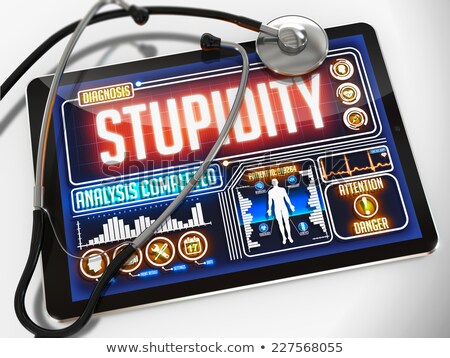 Stock fotó: Stupidity On The Display Of Medical Tablet