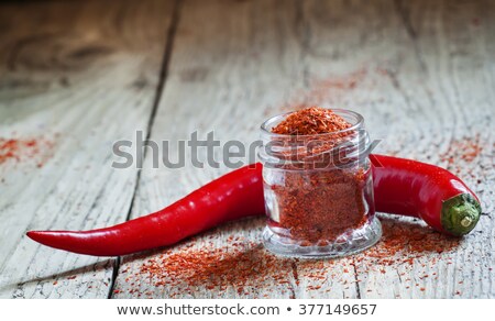 Foto stock: Old Jar Of Chili Peppers